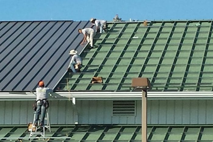 metal roofers installing